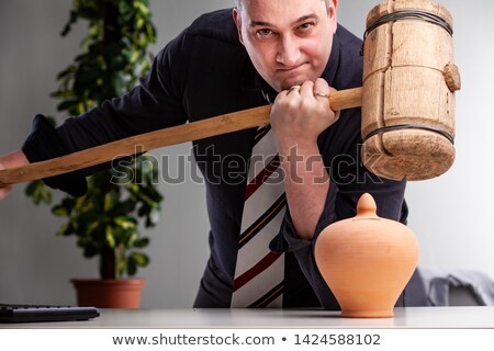 Сток-фото: Determined Man Holding A Large Wooden Mallet