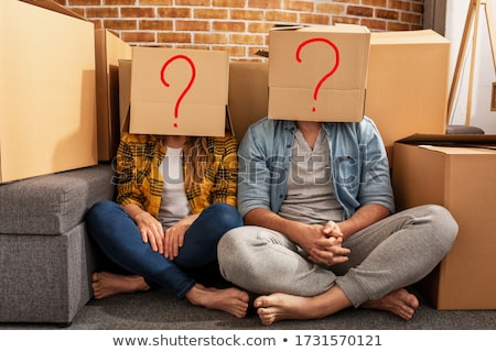 Foto stock: Couple With Boxes Marked Fragile