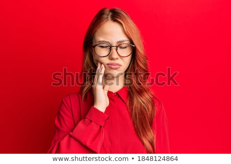 ストックフォト: Young Caring Dentist With Red Glasses