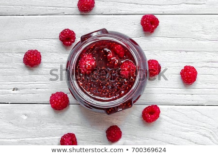 Foto stock: Fresh Raspberries And Jam On Wooden Table