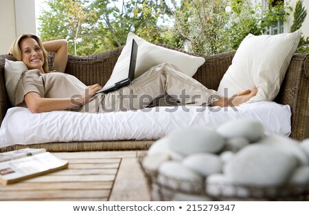 Stock foto: Low Angle View Of Woman With Hands Behind Head