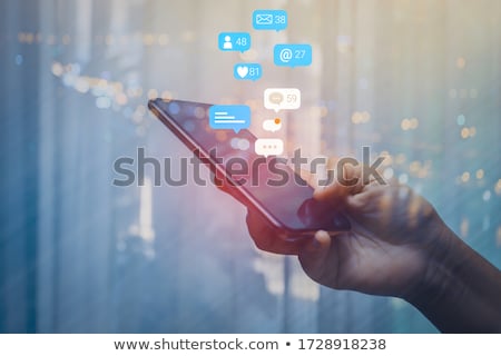 [[stock_photo]]: Hand Using Smartphone With Message Icons