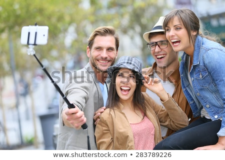 Zdjęcia stock: Friends Taking Picture By Selfie Stick At Summer