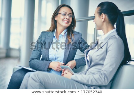 Stok fotoğraf: Two Young Successful Managers Discussing New Ideas