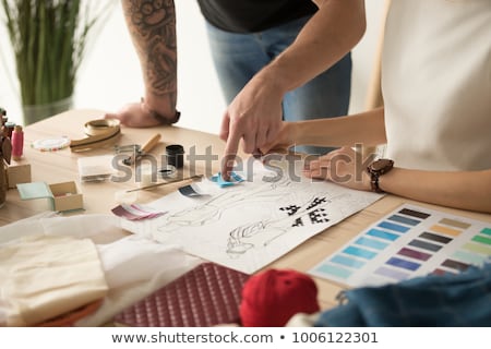 Stok fotoğraf: Team Of Fashion Designers Working At Office