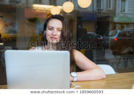 Foto d'archivio: Businesswoman - Telecommuting From Internet Cafe