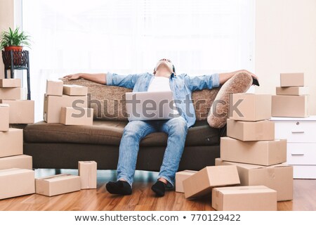 Stock photo: A Tired Man On Moving Day