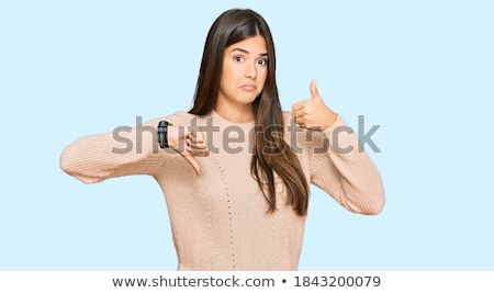 Stockfoto: Woman Showing Thumb Down