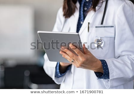 Foto stock: Doctor Using Digital Tablet