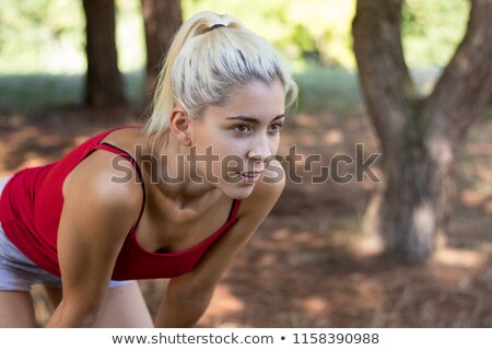 Stok fotoğraf: Voluptuous Female Bending Down