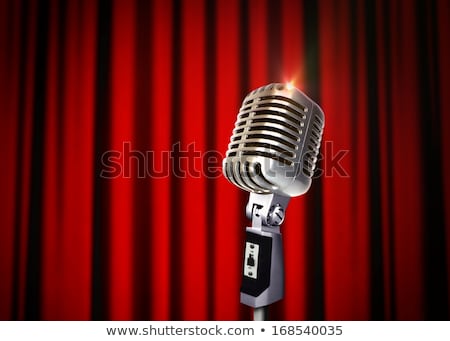 Foto stock: Vintage Microphone Over Red Curtains