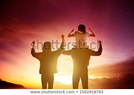 Foto d'archivio: Rear View Of An Asian Young Woman Day Dreaming