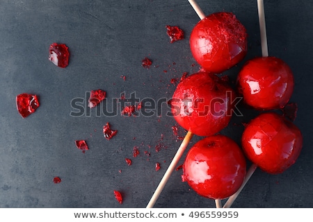 Foto stock: Sweet Glazed Red Toffee Candy Apples On Sticks