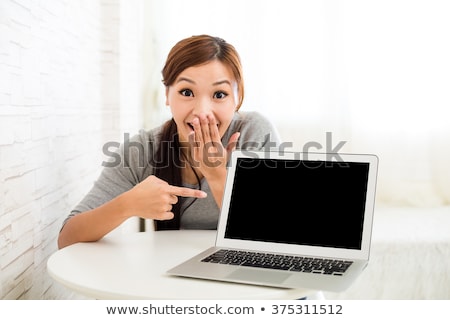 Stock fotó: Shocked Young Asian Woman Showing Display Of Laptop Computer