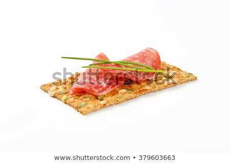 Foto stock: Pumpkin Seed Cracker With Dry Salami