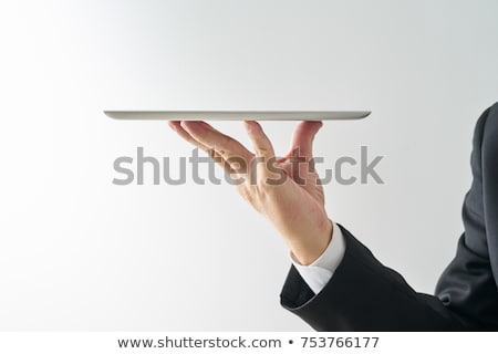 Foto stock: Hand Holding Tablet With Online System Concept