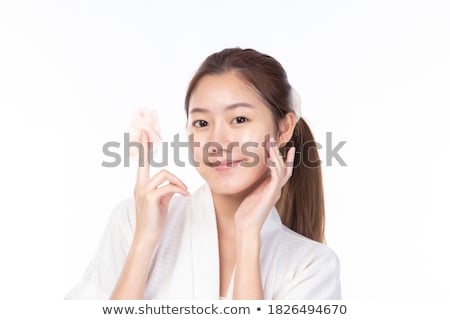 Сток-фото: Beautiful Young Woman Removing Cosmetics With Cleansing Pad Ton