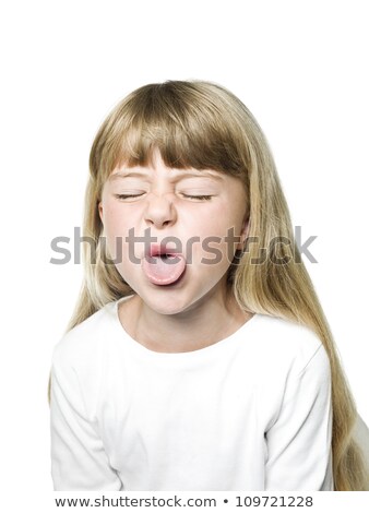 Stok fotoğraf: Girl Making Grimace With Tongue