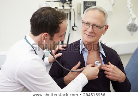 Foto stock: Doctor Examining The Patient