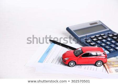 Stok fotoğraf: Toy Car And Calculator