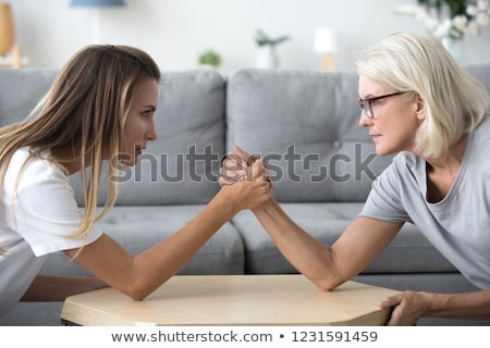 Stock photo: Young Women Warring