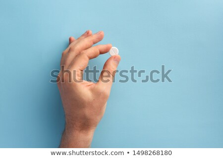 Сток-фото: Male Hand Holding Pills