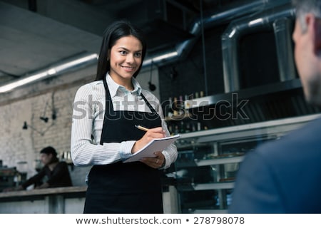 Stock fotó: Waiter Writing Order On Notepad