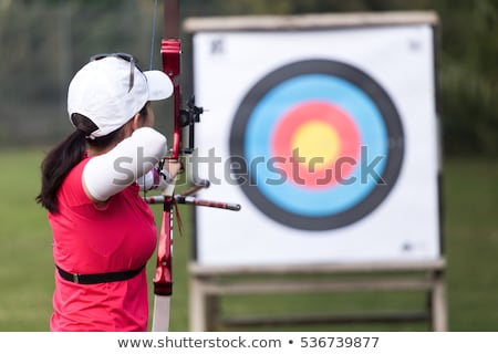 Stock fotó: Young Caucasian Archer Training With A Bow