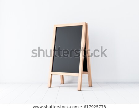 [[stock_photo]]: Wooden Easel With Black Blank Frame 3d Rendering