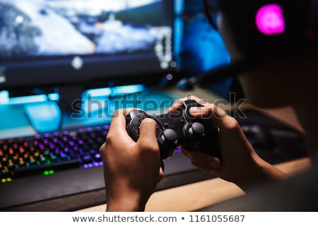 Сток-фото: Photo Closeup Of Asian Gamer Boy Playing Video Games Online On C
