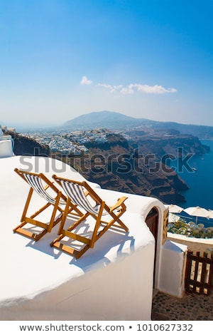 Stock fotó: Sunbeds On Santorini