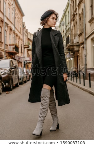 Stock foto: Attractive Young Brunette Woman Wearing Autumn Coat Walking