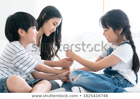 Zdjęcia stock: Beautiful Mom With Her Son Playing Happily