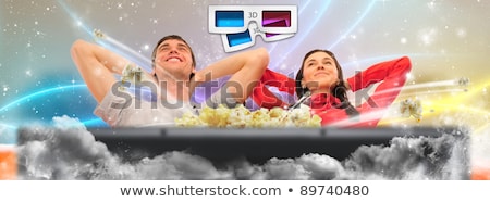 Stockfoto: Close Up Of A Cute Couple Watching Movie On Their Home Cinema St