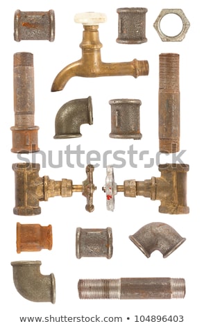 Foto stock: Old Plumbing Pipes With Valves Closeup