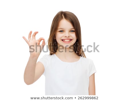 Stok fotoğraf: Teen Girl In Blank White T Shirt Showing Ok Sign