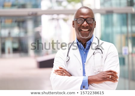 Stock photo: Smiling Male Doctor With Stethoscope