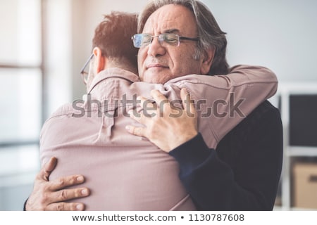 Foto d'archivio: Father And Son Hugging