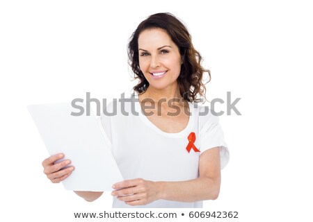 Imagine de stoc: Woman Wearing Red Aids Awareness Ribbon Reading Test Result