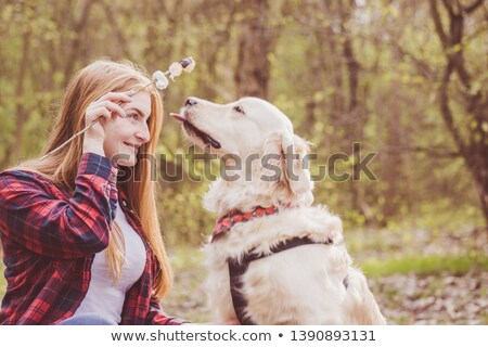 [[stock_photo]]: Female Eating Marshmallows