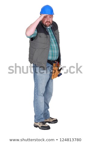 Foto stock: Construction Worker Squinting Into The Distance