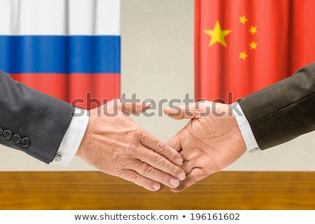 Businessmen Of Russia And China Shake Hands Stock fotó © Zerbor