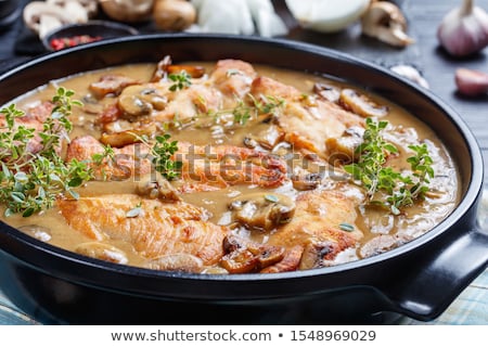 Сток-фото: Meat Cutlets In Frying Pan On Wooden Rustic Table
