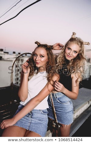 Foto stock: Lifestyle And People Concept Fashion Portrait Of Two Stylish Sexy Girls Best Friends Happy Time For