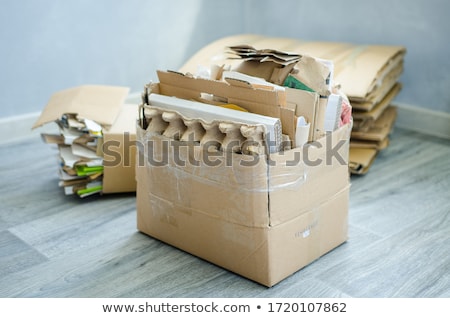 Foto d'archivio: Green Recycle Bins With Used Bottle And Tin Can