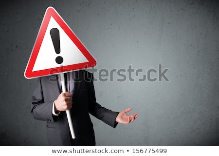 Stok fotoğraf: Person Standing With Exclamation Sign Concept