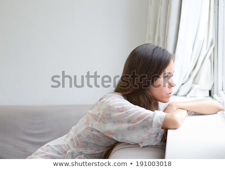 Stockfoto: Closeup Portrait Of Young Pretty Lonely Woman