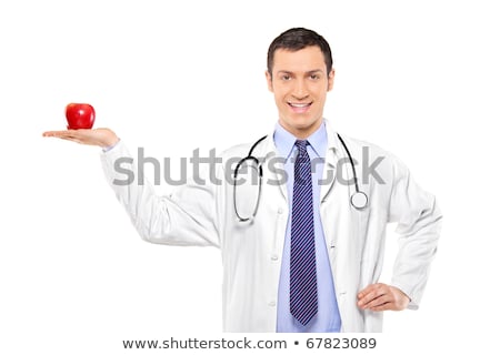Сток-фото: Portrait Of A Male Doctor Holding Red Apple On White