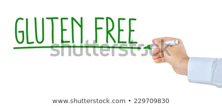 Foto stock: Hand With Pen Writing Gluten Free