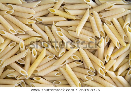 ストックフォト: Background Texture Of Penne Rigate Or Ziti Pasta